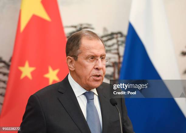 Russias Foreign Minister Sergei Lavrov speaks during his press conference with Chinese State Councilor and Foreign Minister Wang Yi at the Diaoyutai...