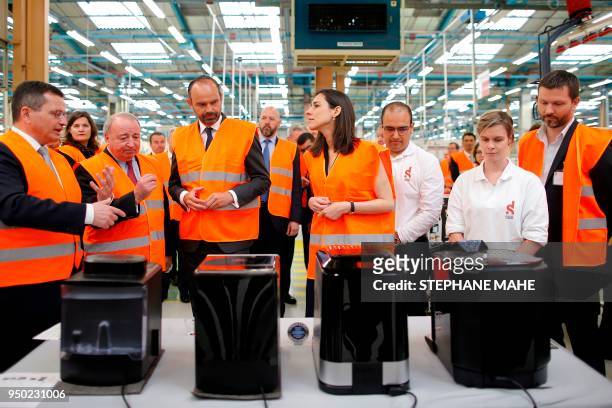 French Prime Minister Edouard Philippe , Thierry de la Tour d'Artaise, Chairman and CEO of French electrical goods company Groupe SEB and French...