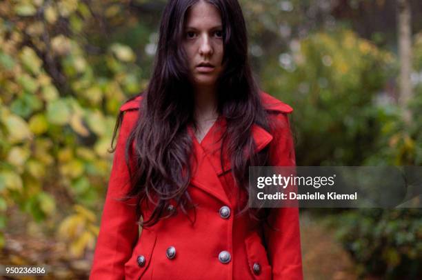 girl standing in garden, staring at camera, front view - katoomba falls stock pictures, royalty-free photos & images