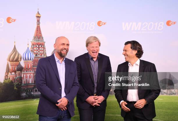 Holger Stanislawski, Oliver Kahn and Urs Meier pose for a picture during the ARD and ZDF FIFA World Cup presenter team presentation on April 23, 2018...