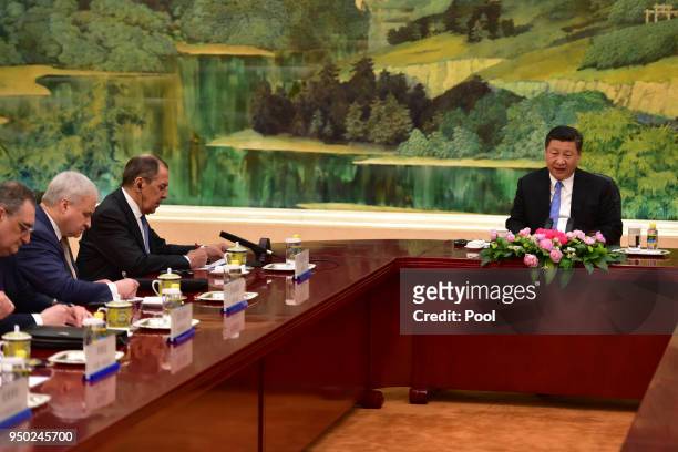 Russian Foreign Minister Sergei Lavrov attends a meeting with Chinese President Xi Jinping at the Great Hall of the People on April 23, 2018 in...