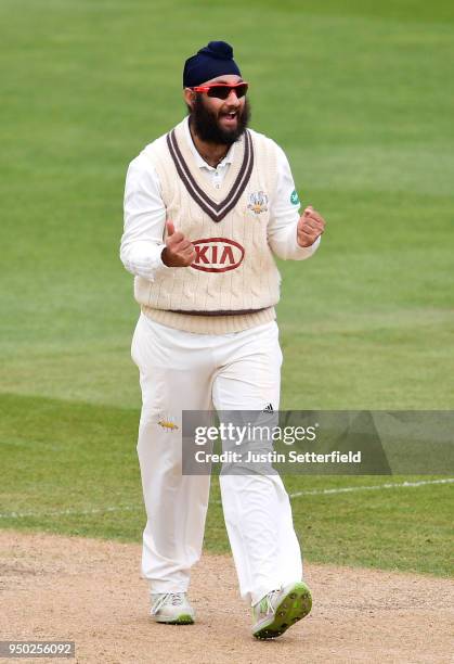 Amar Virdi of Surrey celebrates taking the wicket of Kyle Abbott of Hampshire during the Specsavers County Championship: Division One match between...