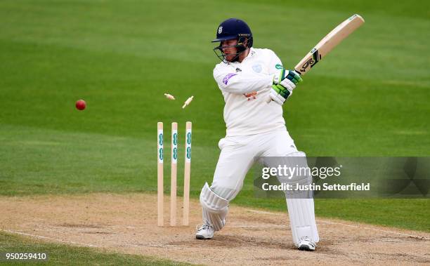 Liam Dawson of Hampshire is bowled by Jade Dernbach of Surrey during the Specsavers County Championship: Division One match between Surrey and...