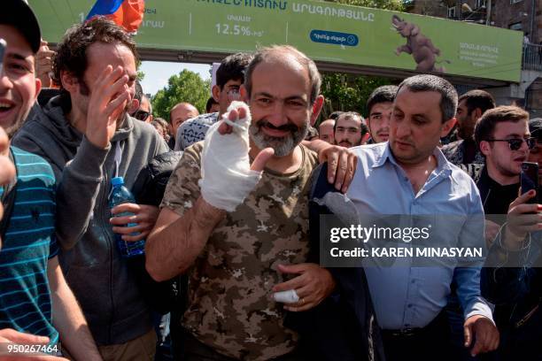 The leader of Armenia's mass anti-government protests Nikol Pashinyan meets with supporters upon his release in Yerevan on April 23, 2018. -...