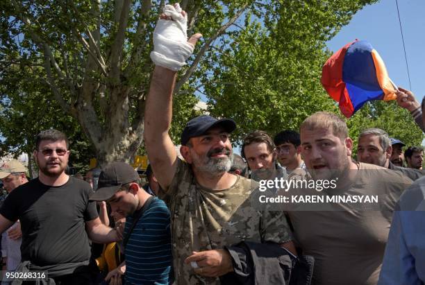 The leader of Armenia's mass anti-government protests Nikol Pashinyan meets with supporters upon his release in Yerevan on April 23, 2018. -...