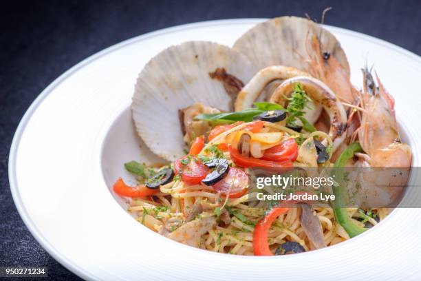 seafood spaghetti - jordan lye stock pictures, royalty-free photos & images