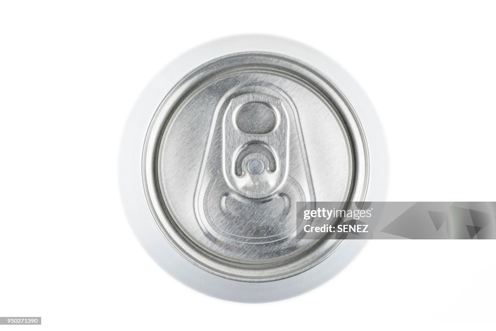 The top of an aluminum soda can with the ring pull showing