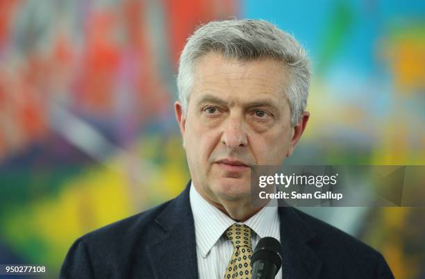 High Commissioner for Refugees Filippo Grandi and German Chancellor Angela Merkel give statements to the media prior to talks at the Chancellery on...