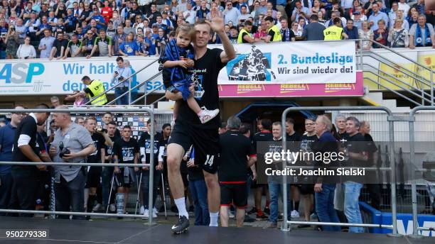 Thomas Bertels of Paderborn celebrate after the 3. Liga match between SC Paderborn 07 and SpVgg Unterhaching at Benteler Arena on April 21, 2018 in...