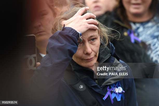Supporters react to the announcement that the European court of human rights refused to intervene in the case of British toddler Alfie Evans outside...