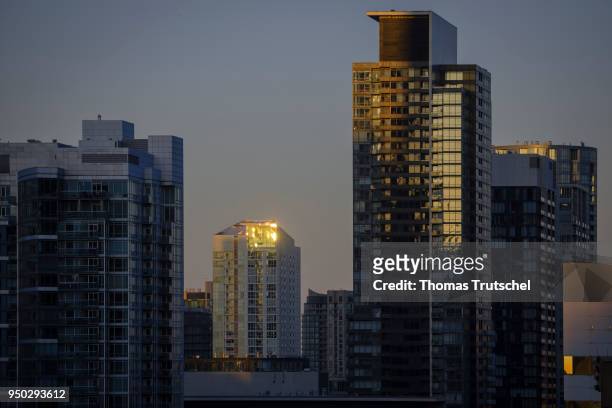 Toronto, Canada Skyscrapers are illuminated by the rising sun on April 22, 2018 in Toronto, Canada.