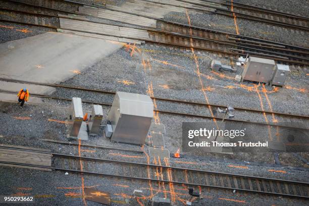 Toronto, Canada A worker runs over a track construction site on which colored markings were painted on the floor on April 22, 2018 in Toronto, Canada.