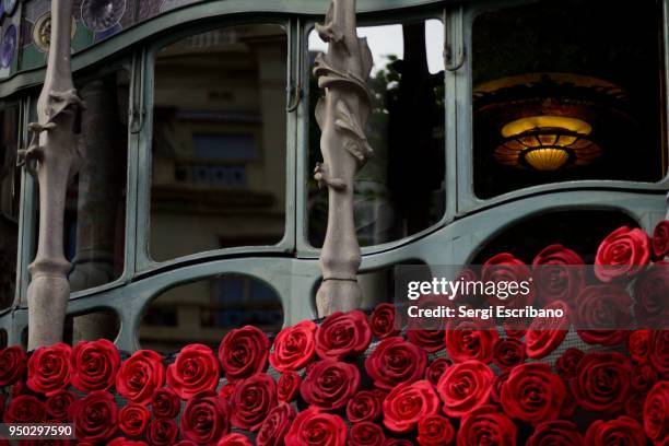 casa batllo by the famous architect antoni gaudi decorated to celebrate the day of sant jordi - casa rosa stock pictures, royalty-free photos & images