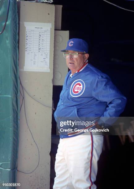 Manager Jim Frey of the Chicago Cubs looks on from the dugout during a Major League Baseball game against the Pittsburgh Pirates at Three Rivers...