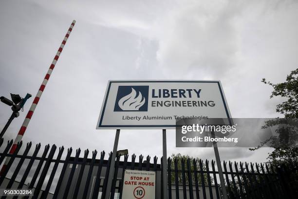 Logo stands at the entrance to the Liberty Aluminium Technologies engineering facility in Coventry, U.K., on Monday, April 23, 2018. Aluminum markets...