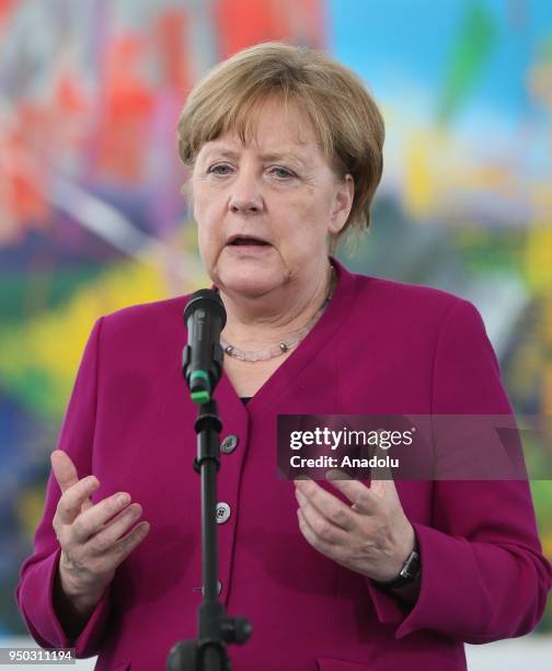 German Chancellor Angela Merkel makes a speech during a joint press conference with UN High Commissioner for Refugees Filippo Grandi following their...