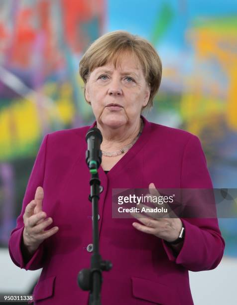 German Chancellor Angela Merkel makes a speech during a joint press conference with UN High Commissioner for Refugees Filippo Grandi following their...
