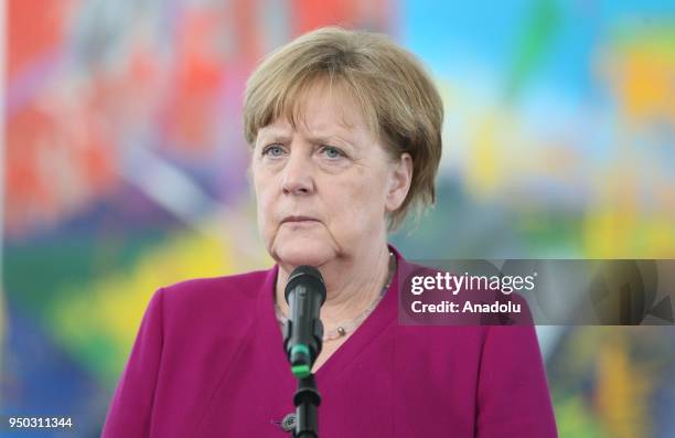 German Chancellor Angela Merkel makes a speech during a joint press conference with UN High Commissioner for Refugees Filippo Grandi following their...