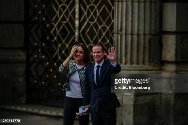 Ricardo Anaya, presidential candidate for the National Action Party , right, waves with his wife Carolina Martinez as he arrives for the first...