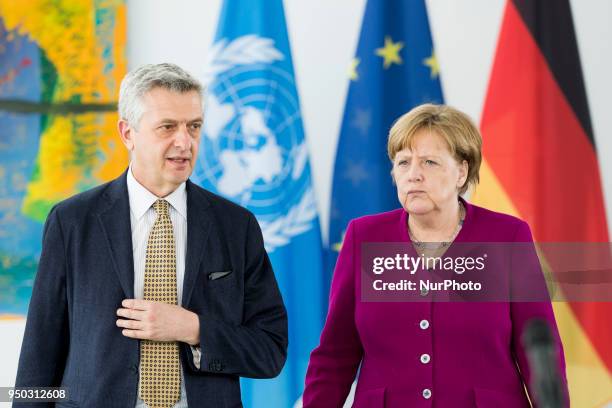 German Chancellor Angela Merkel and United Nations High Commissioner for Refugees Filippo Grandi arrive to give a statement to the press prior to a...