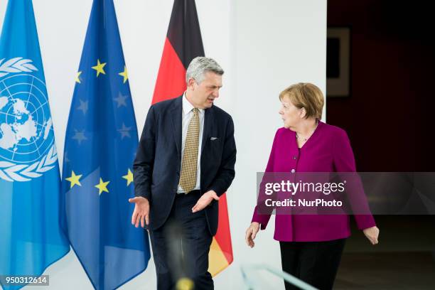 German Chancellor Angela Merkel and United Nations High Commissioner for Refugees Filippo Grandi arrive to give a statement to the press prior to a...