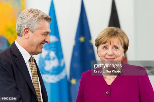 German Chancellor Angela Merkel and United Nations High Commissioner for Refugees Filippo Grandi shake hands after giving a statement to the press...