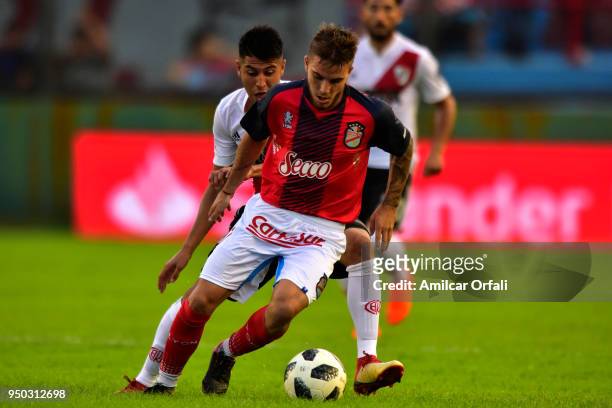 Emiliano Purita of Arsenal fights for the ball with Exequiel Palacios during a match between Arsenal and River Plate as part of Argentina Superliga...