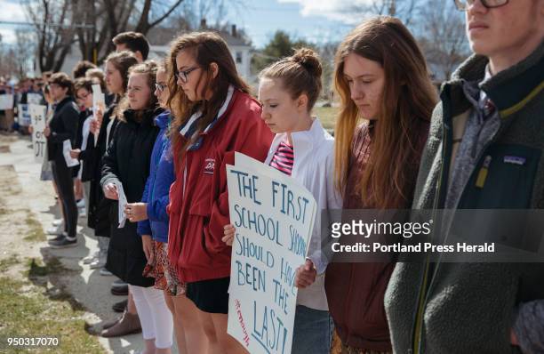 North Yarmouth Academy sophomores, from far right, Will Tatge, Eliza Tod, Bronwen Ramsey-Brimberg and Afton Morton stand in a line on Main Street in...
