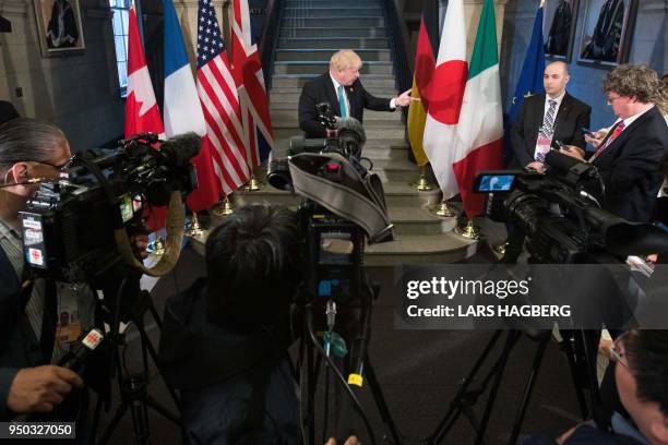 British Foreign Secretary Boris Johnson holds media availability during the G7 Foreign Minister meeting in Toronto, Ontario on April 23, 2018. - The...