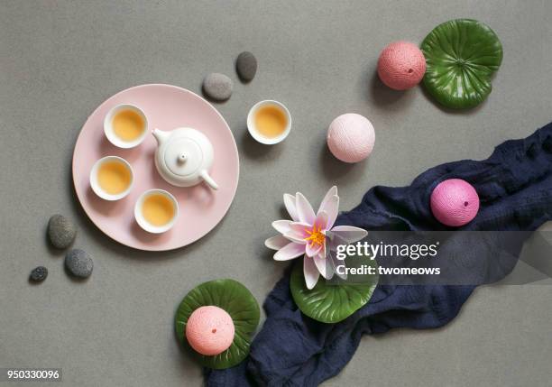 east asian afternoon tea break objects on texture background. - tea cup overhead view photos et images de collection