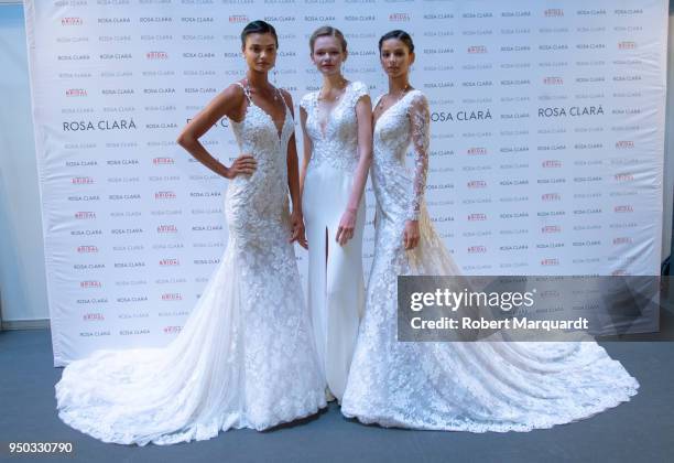 Daniela Braga, Matiu and Bruna Lirio pose backstage during a Rosa Clara fitting for Barcelona Bridal Week 2018 on April 23, 2018 in Barcelona, Spain.