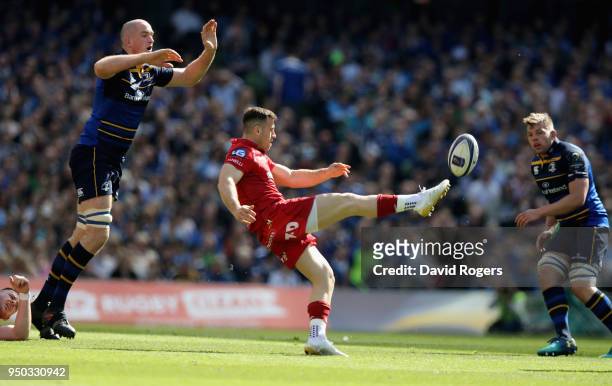 Gareth Davies of the Scarlets kicks the ball upfield during the European Rugby Champions Cup Semi-Final match between Leinster Rugby and Scarlets at...