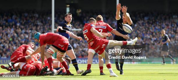 Gareth Davies of the Scarlets kicks the ball upfield during the European Rugby Champions Cup Semi-Final match between Leinster Rugby and Scarlets at...