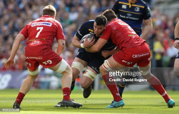 James Ryan of Leinster is tackled by David Bulbring during the European Rugby Champions Cup Semi-Final match between Leinster Rugby and Scarlets at...