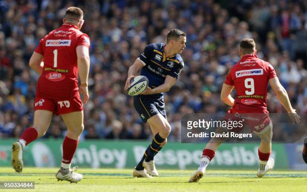 Jonathan Sexton of Leinster looks to off load the ball during the European Rugby Champions Cup Semi-Final match between Leinster Rugby and Scarlets...
