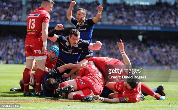 Leinster's Jamison Gibson-Park celebrates as James Ryan dives over for the first try during the European Rugby Champions Cup Semi-Final match between...