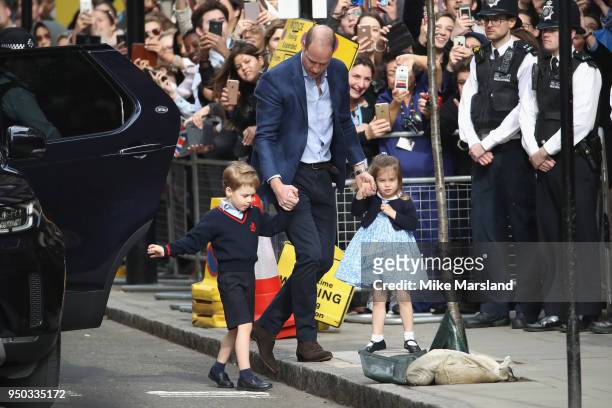 Prince William, Duke of Cambridge arrives with Prince George and Princess Charlotte at the Lindo Wing after Catherine, Duchess of Cambridge gave...