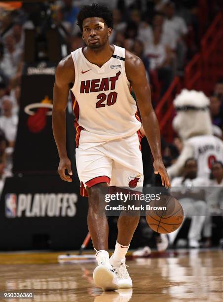 Justise Winslow of the Miami Heat brings the ball up the court in the third quarter against the Philadelphia 76ers during Game Four of Round One of...