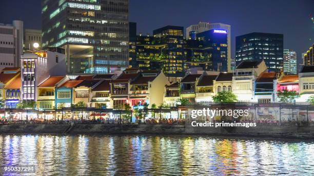 view of the skyline of singapore downtown cbd - merlion park stock pictures, royalty-free photos & images