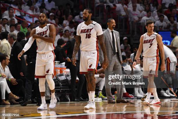 Miami Heat assistant coach Juwan Howard with Wayne Ellington, James Johnson, and Goran Dragic of the Miami Heat in action in the first quarter...
