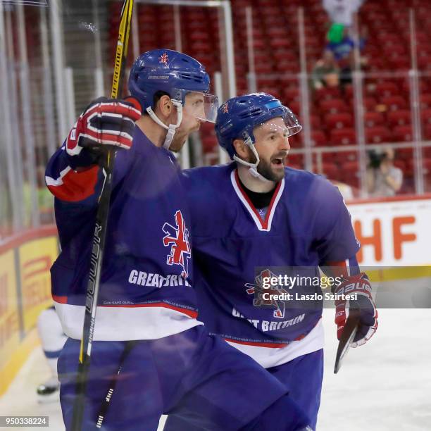 Brett Perlini of Great Britain celebrates his goal with Robert Dowd of Great Britain during the 2018 IIHF Ice Hockey World Championship Division I...