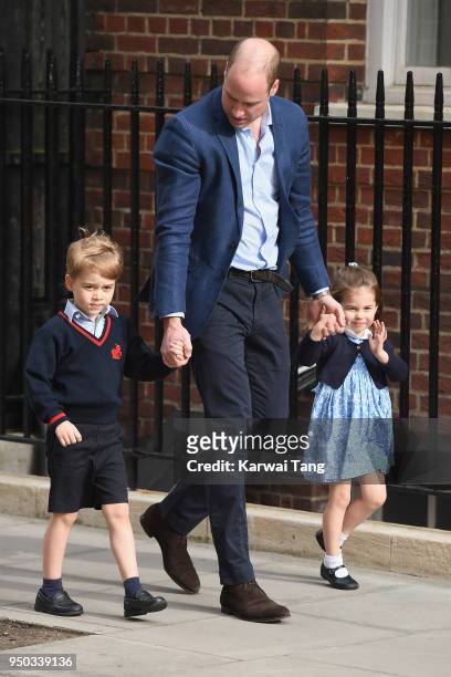Prince William, Duke of Cambridge arrives with Prince George and Princess Charlotte at the Lindo Wing after Catherine, Duchess of Cambridge gave...