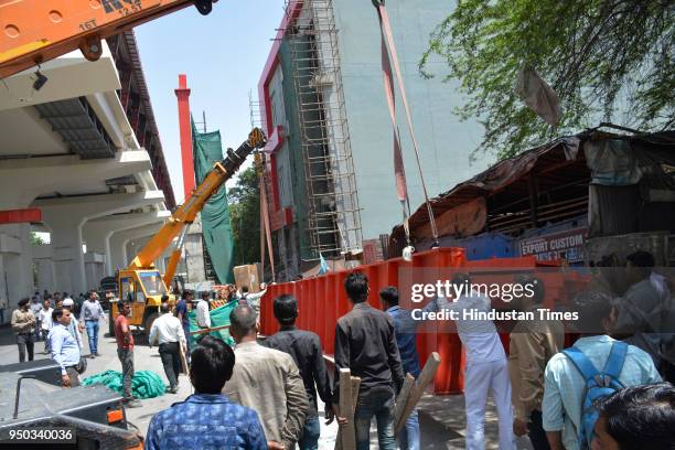 Number of people sustained severe injuries after a girder, which was being used by the Delhi Metro for the construction of a foot-over bridge...