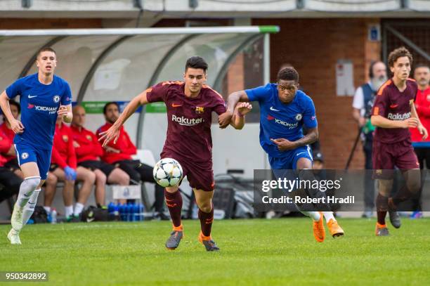 Juan Brandariz of FC Barcelona vies with Daishawn Redan of Chelsea FC during the UEFA Youth League Final match between Chelsea FC and FC Barcelona at...