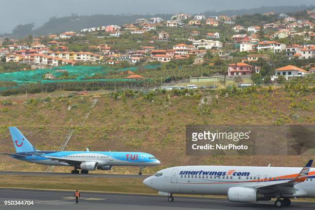 Airways plane, the world's largest charter airline, and SmartWings, a Czech airline Travel Service plane seen ready to take off from Cristiano...
