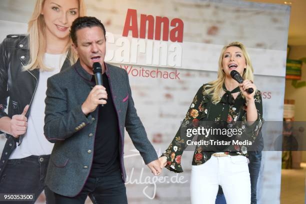 Anna-Carina Woitschack and her boyfriend Stefan Mross promote their new album 'Liebe passiert' at Lausitz Park shopping mall on April 23, 2018 in...