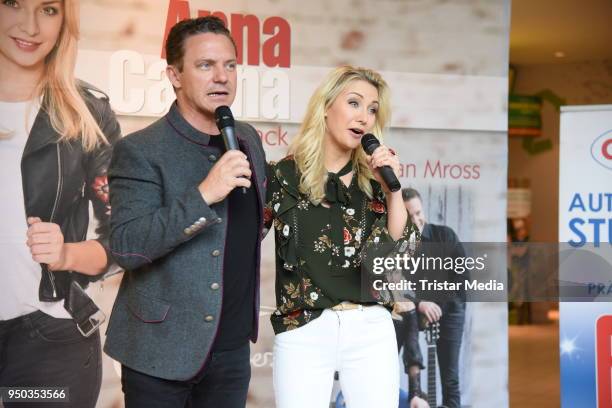 Anna-Carina Woitschack and her boyfriend Stefan Mross promote their new album 'Liebe passiert' at Lausitz Park shopping mall on April 23, 2018 in...