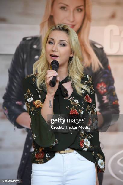 Anna-Carina Woitschack and her boyfriend Stefan Mross promote their new album 'Liebe passiert' at Lausitz Park shopping mall on April 23, 2018 in...