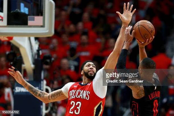 Damian Lillard of the Portland Trail Blazers shoots over Anthony Davis of the New Orleans Pelicans during Game 3 of the Western Conference playoffs...