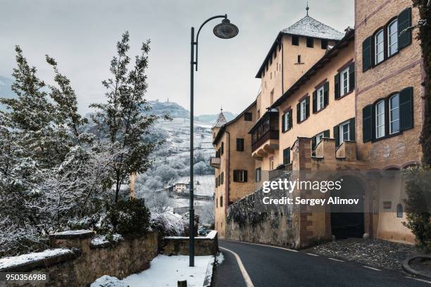 romance architecture in bolzano in winter - roadside stock pictures, royalty-free photos & images